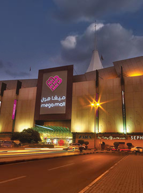 Mega Mall exterior at night